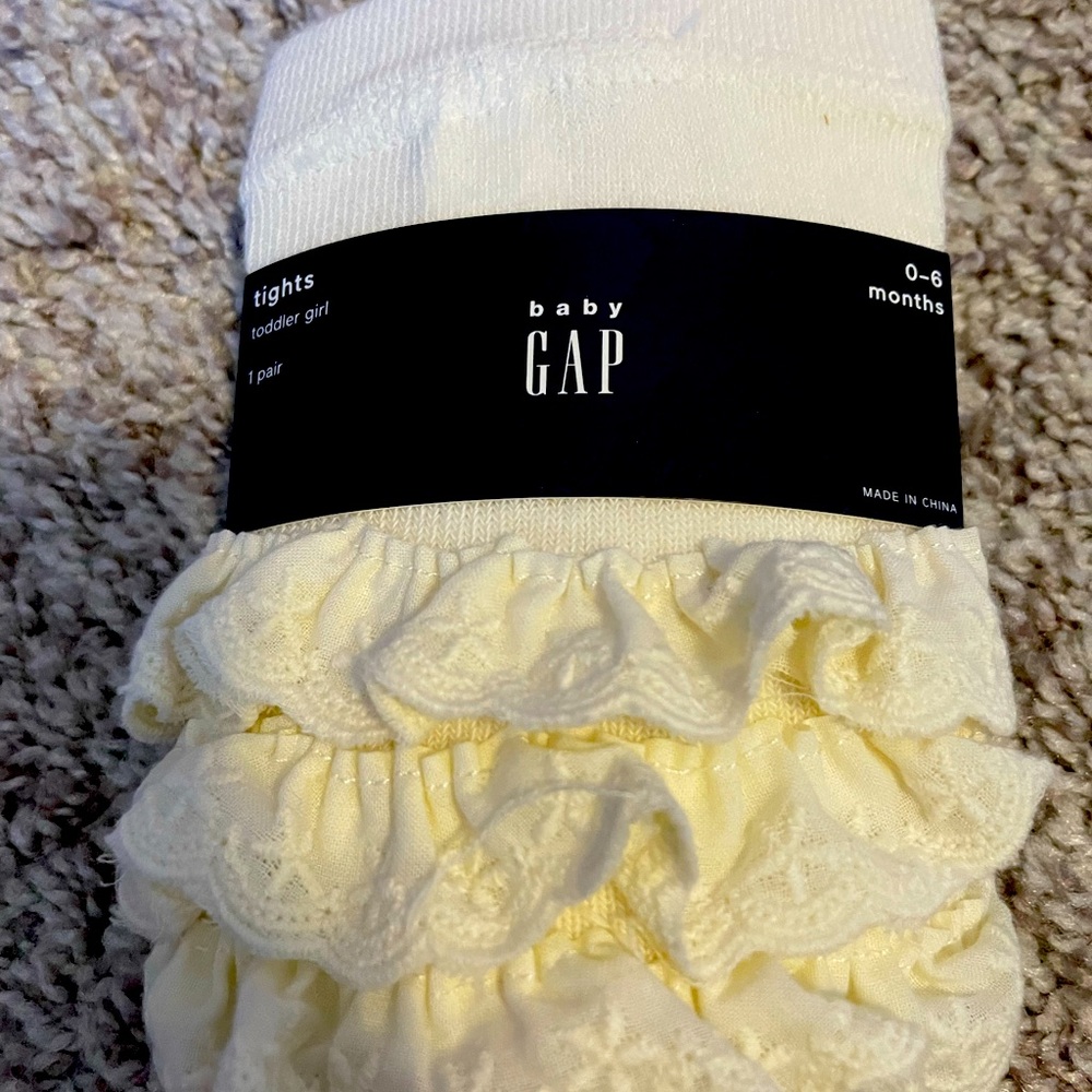 2 pairs of knit ruffle tights (cream and black)